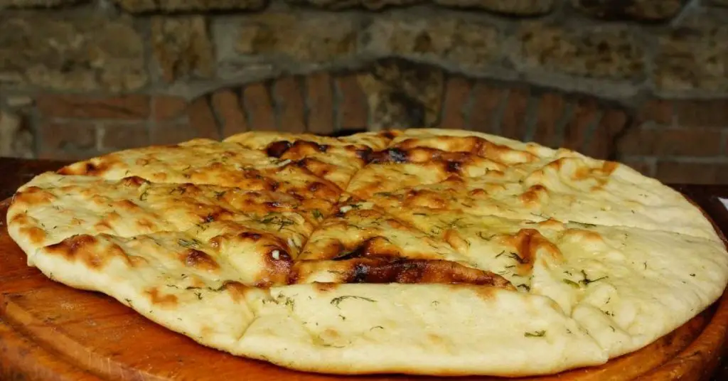 ancient style flatbread How Was Pizza Invented?