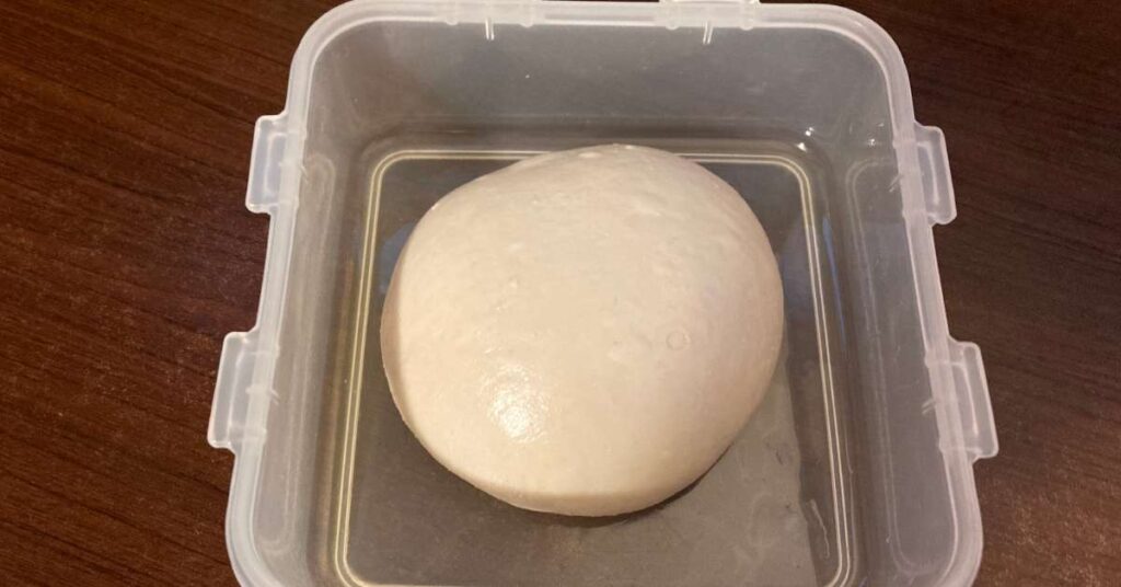 high hydration pizza dough ball Domenic's Detroit Style Pizza Dough Recipe (no-knead)
