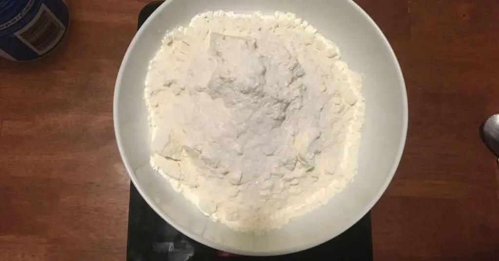 00 flour with salt Why Your Pizza Dough Is Too Hard, And How To Make It Stretch Easily