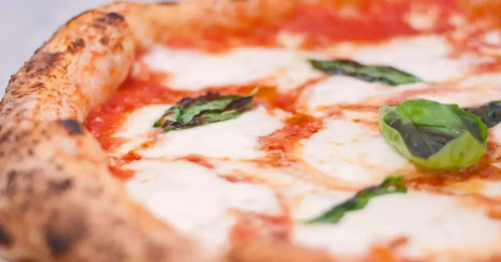 Neapolitan Pizza Mozzarella How To Make AUTHENTIC Neapolitan Pizza At Home—Easy, Cheap, and Delicious