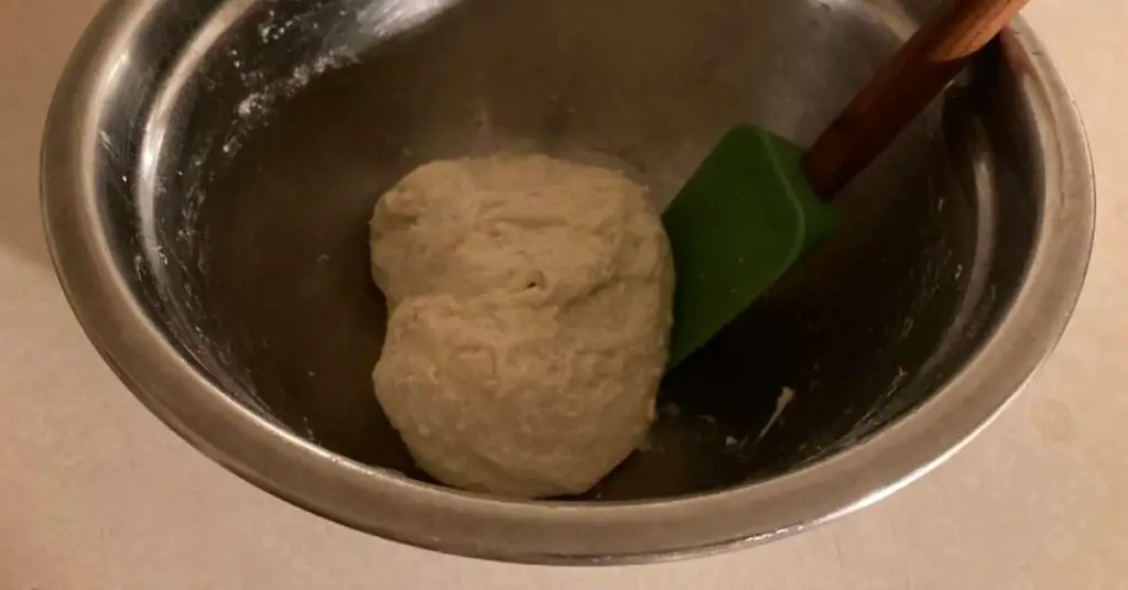 kneading pizza dough Authentic Neapolitan Pizza Recipe - 70% Hydration, Cold-Fermented, No-Knead, Direct Method