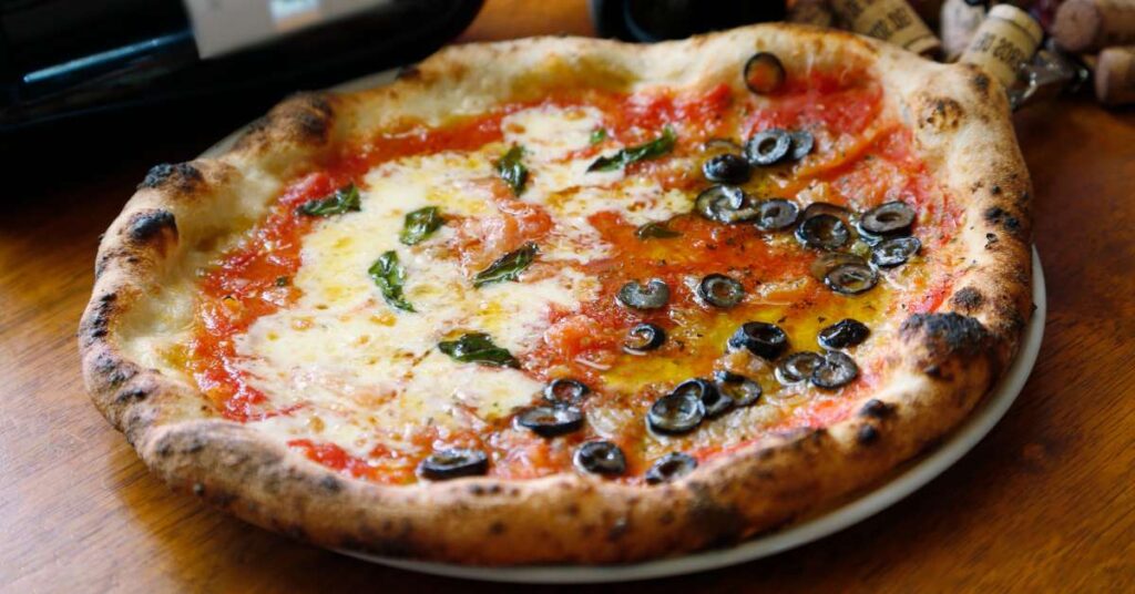 pizza marinara margherita half What is Pizza? A Comprehensive Guide to (possibly) the World's Most Delicious Food