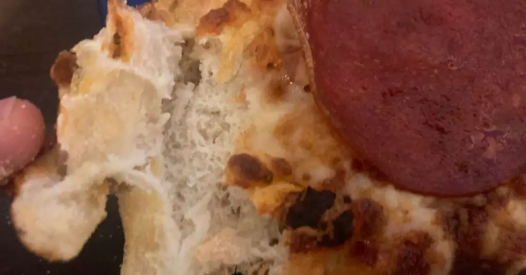 Domino's Pizza Crust Types Explained – From Brooklyn Style to Gluten Free 9 Dominos pizza slice gluten crumb Domino's Pizza Crust Types Explained – From Brooklyn Style to Gluten Free
