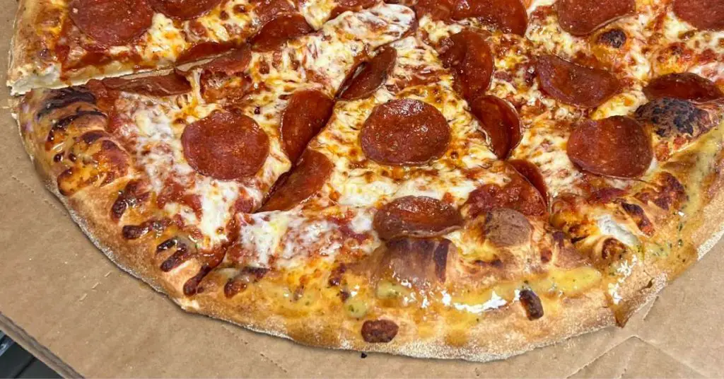 dominos hand tossed crust pizza How Many Calories are REALLY in a Slice of Pizza? More Than You Think...