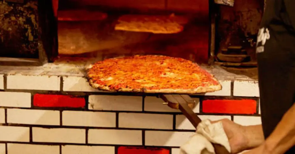 Sallys New Haven pizza cooking What Is New Haven Style Pizza, And Why Is It Called "Apizza"?