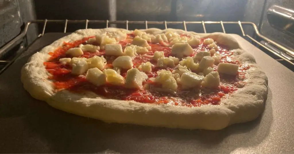 Ooni Pizza Steel 13 Review – Pizzeria Quality Pizza Without A Pizza Oven 10 ooni pizza steel cooking Ooni Pizza Steel 13 Review – Pizzeria Quality Pizza Without A Pizza Oven