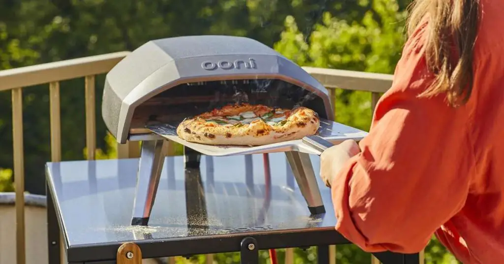 Can You Use Ooni Indoors? How & When To Use An Ooni Pizza Oven Indoors 1 ooni koda 12 pizza oven outside Can You Use Ooni Indoors? How & When To Use An Ooni Pizza Oven Indoors